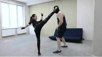 Tiffany punishes the burglar destroying his balls Tiffany punishes the burglar destroying his balls